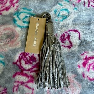 MICHAEL KORS SILVER TASSEL CHARM